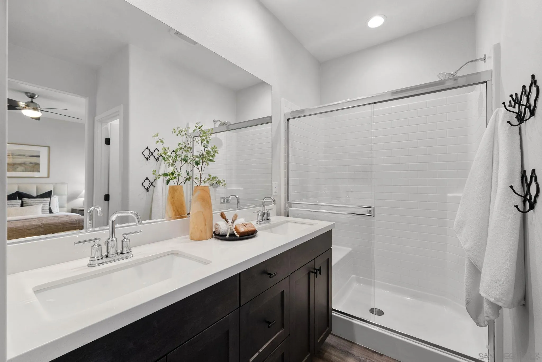 4229 Mission Ranch Way Oceanside, CA 92057 - Photo 13 of 26 a bathroom with a sink and a mirror