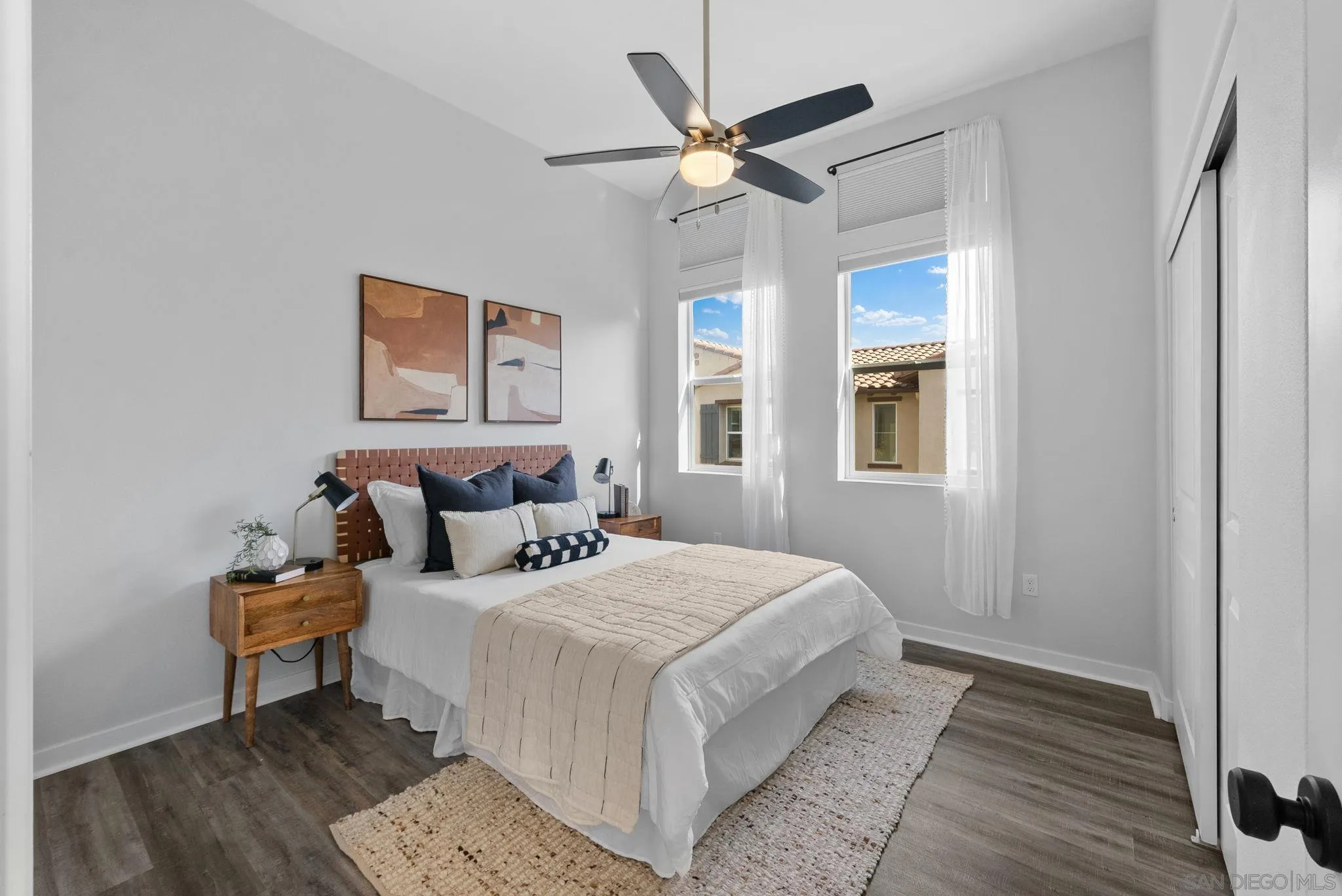 4229 Mission Ranch Way Oceanside, CA 92057 - Photo 15 of 26 a bedroom with bed and a window