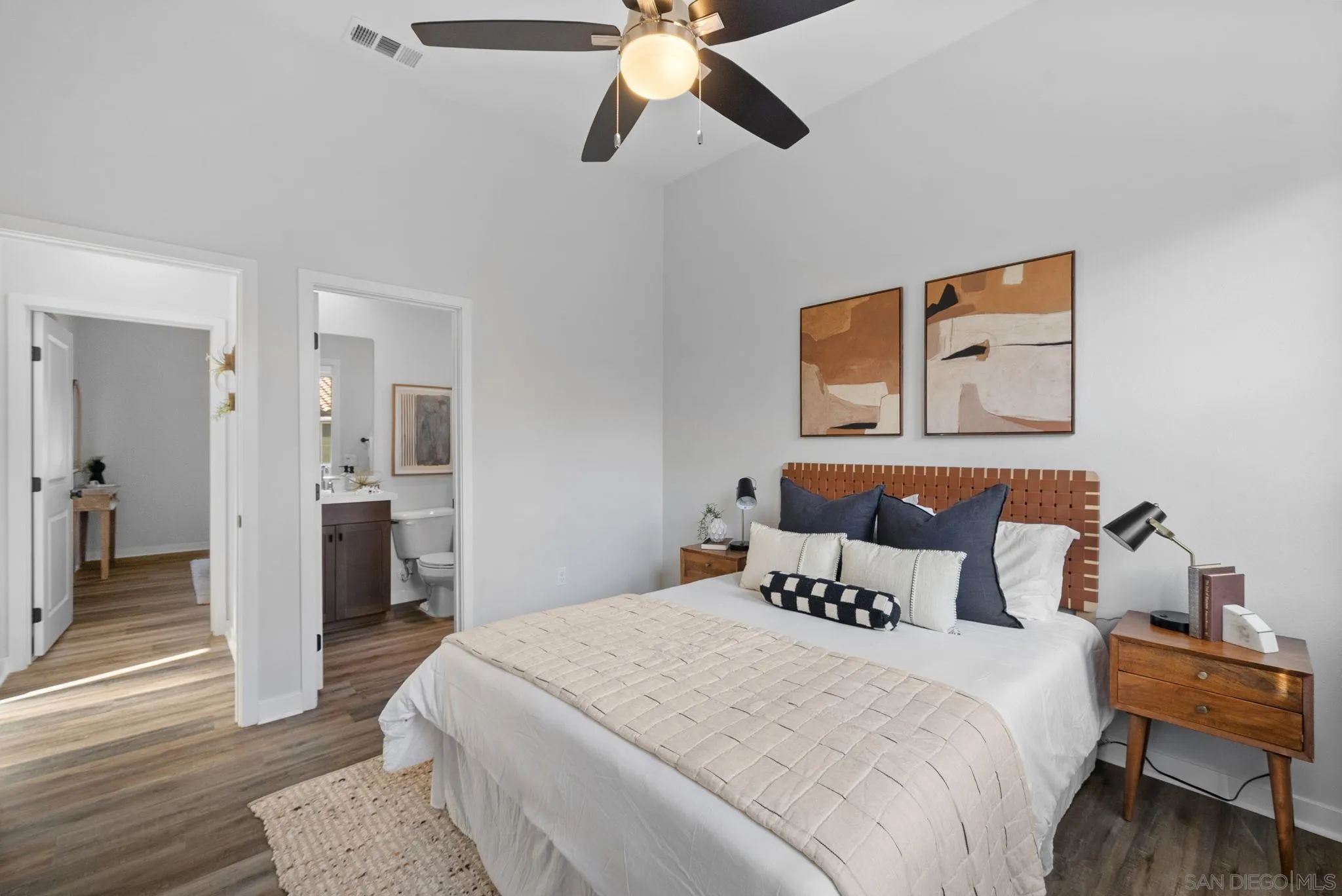 4229 Mission Ranch Way Oceanside, CA 92057 - Photo 16 of 26 a bedroom with a bed and a painting