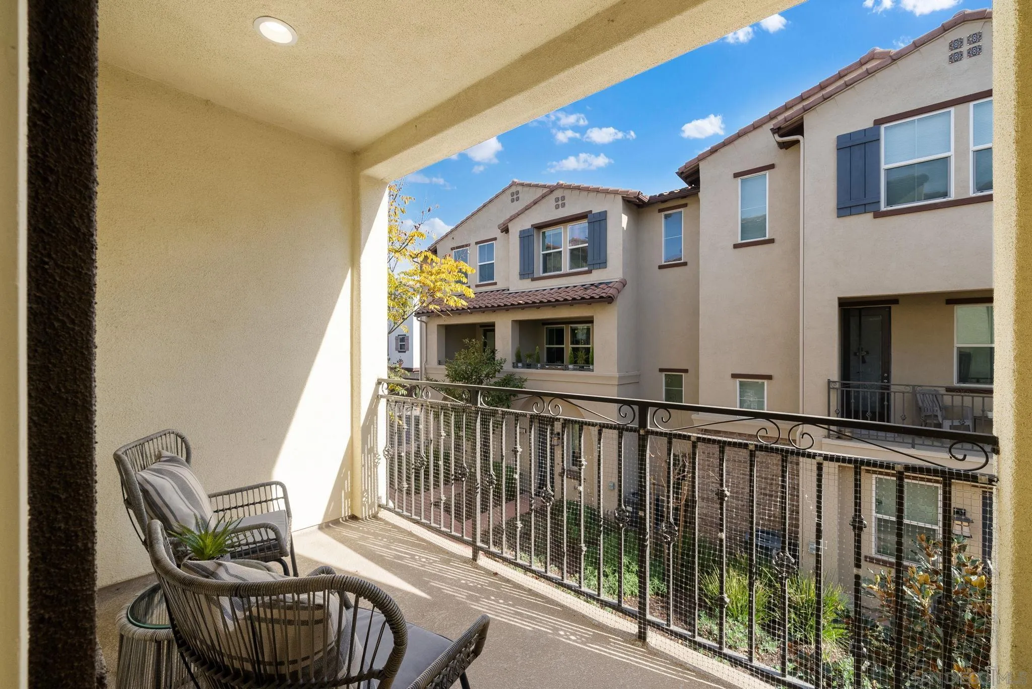 4229 Mission Ranch Way Oceanside, CA 92057 - Photo 19 of 26 a balcony with table and chairs
