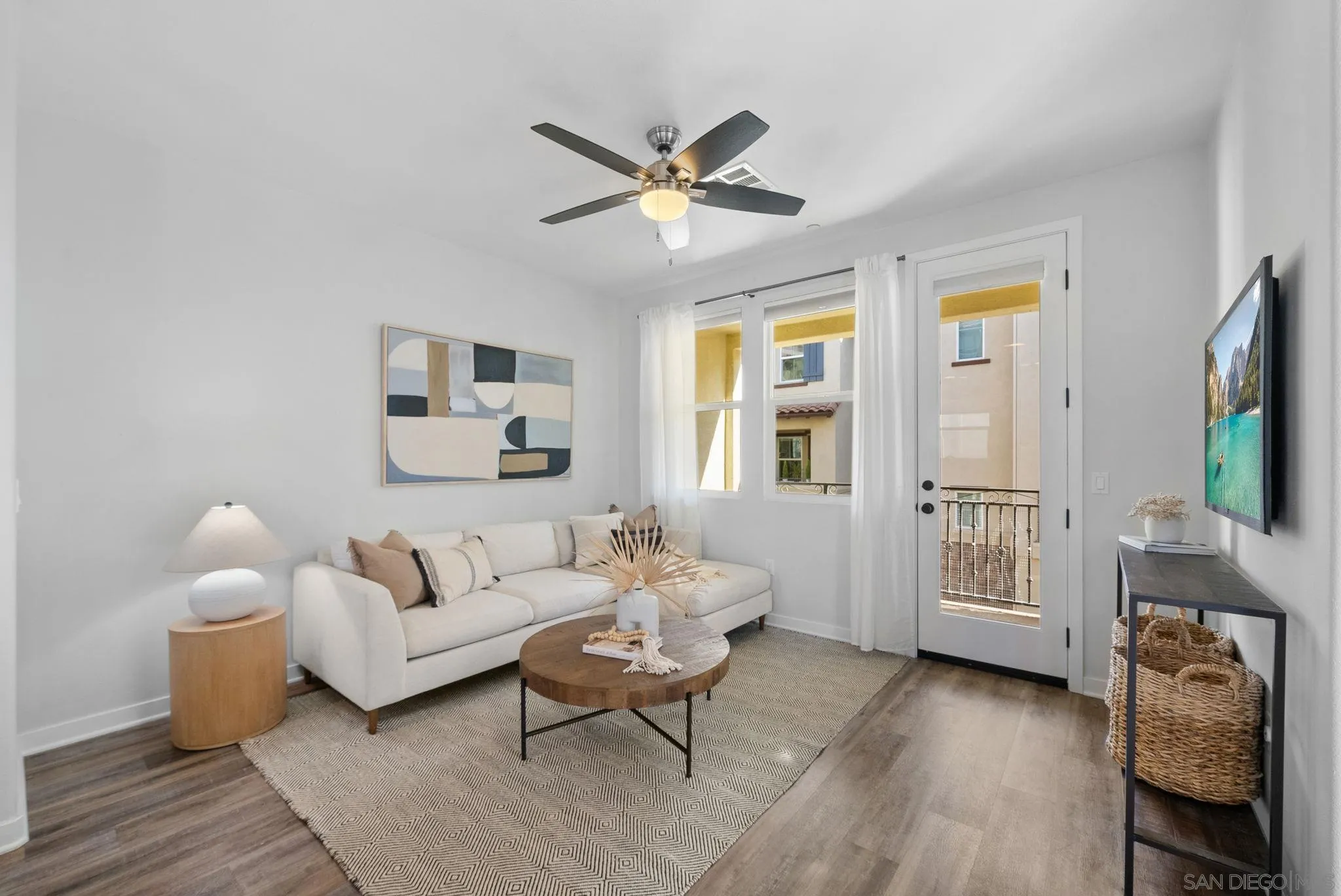 4229 Mission Ranch Way Oceanside, CA 92057 - Photo 7 of 26 a living room with furniture and a flat screen tv