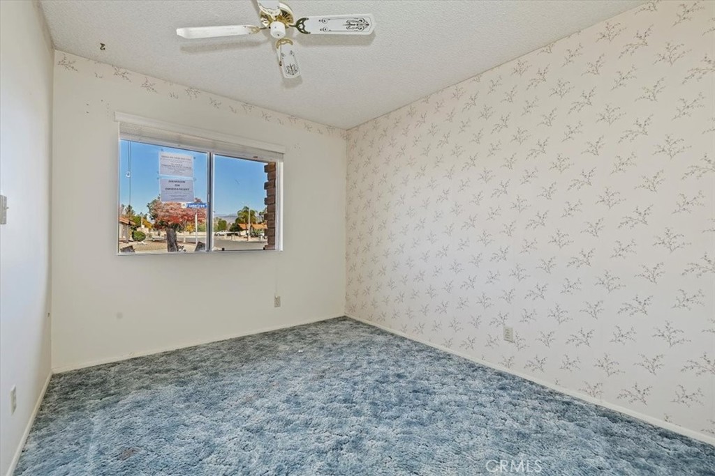 1825 Flame Tree Way Hemet, CA 92545 - Photo 15 of 23 wooden floor in a hall with a window