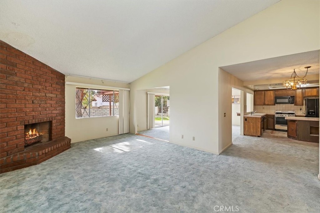 1825 Flame Tree Way Hemet, CA 92545 - Photo 6 of 23 a view of a livingroom with a fireplace