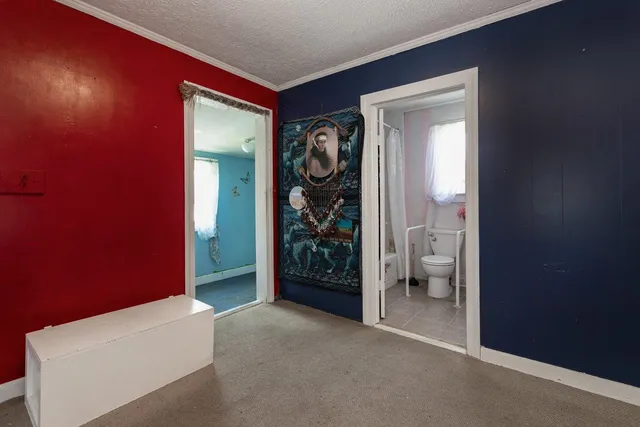 a bathroom with a bathtub and shower