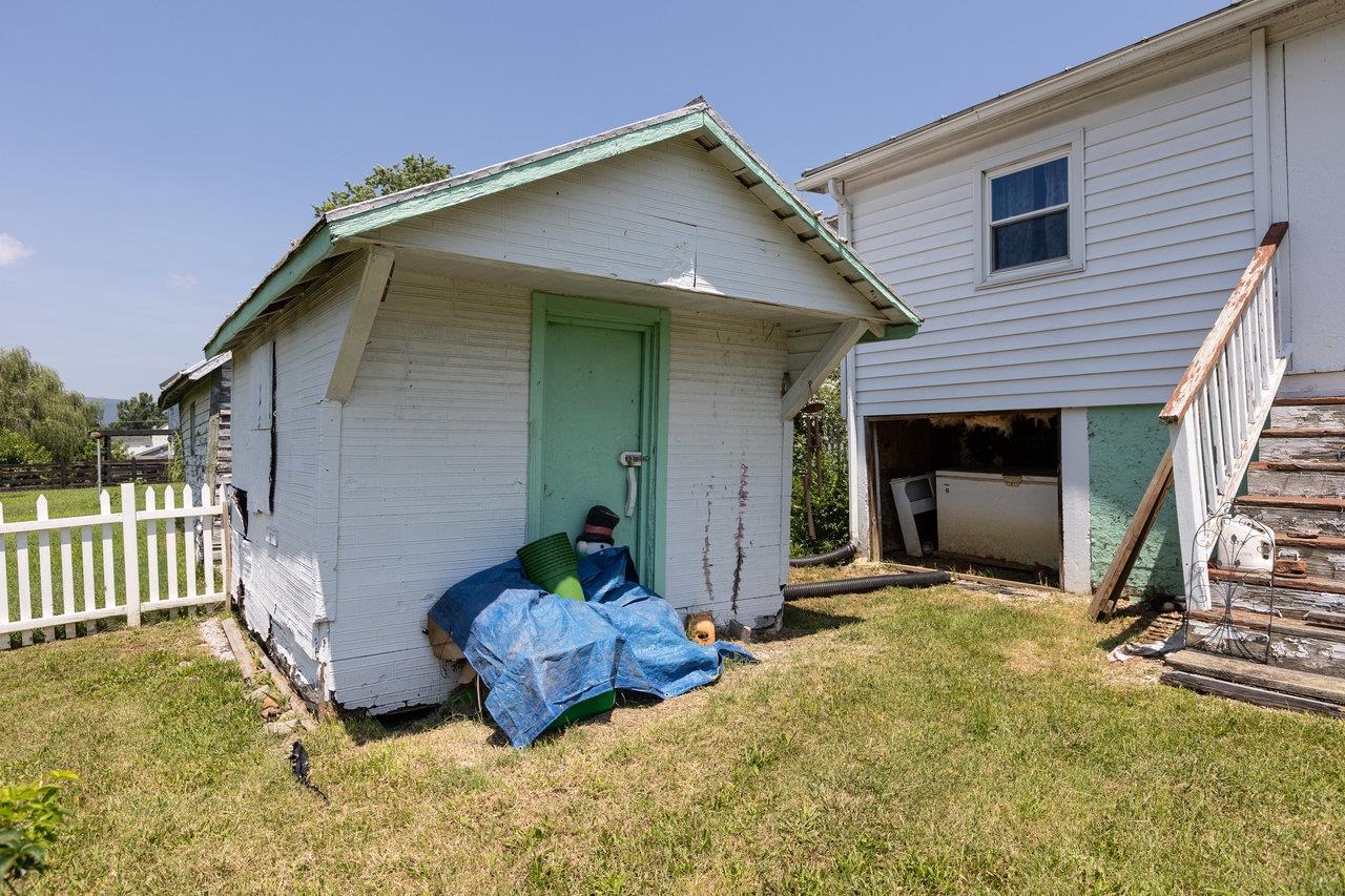 711 8th Street Shenandoah, VA 22849 - Photo 39 of 60 a view of a house with a yard and floor to ceiling window