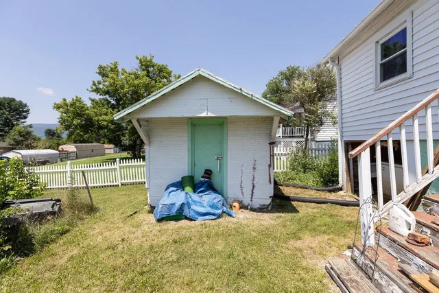 an aerial view of residential houses and outdoor space