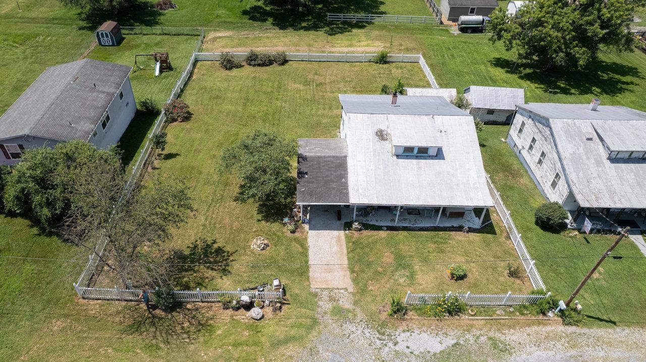 711 8th Street Shenandoah, VA 22849 - Photo 43 of 60 an aerial view of a house with swimming pool and large trees