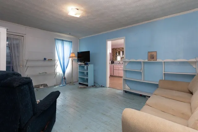 a spacious en suite bathroom with a double vanity sink a mirror a and a shower