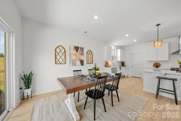 a view of a dining room with furniture