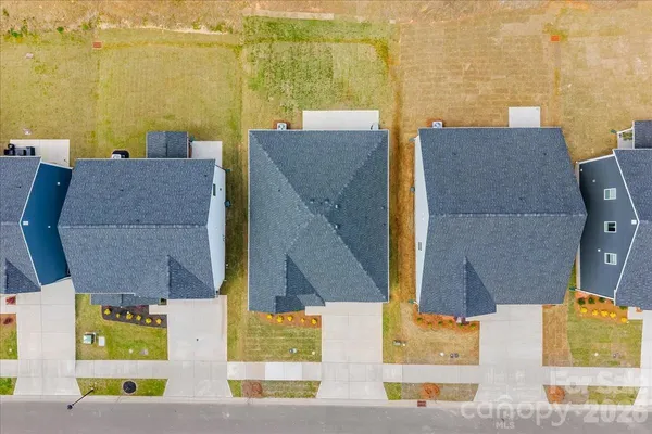 aerial view of residential houses with outdoor space