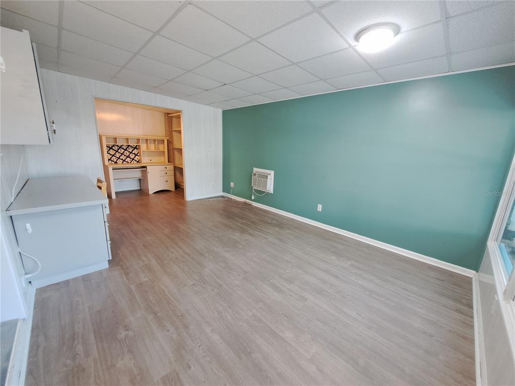 116 Maple Leaf Drive Palm Harbor, FL 34684 - Photo 21 of 38 a view of a livingroom with wooden floor