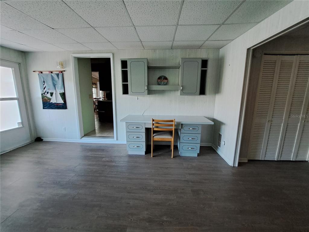 116 Maple Leaf Drive Palm Harbor, FL 34684 - Photo 22 of 38 a room with furniture and window