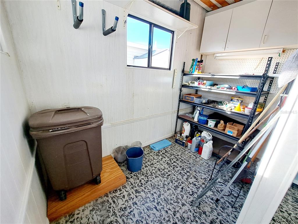 116 Maple Leaf Drive Palm Harbor, FL 34684 - Photo 28 of 38 a storage room