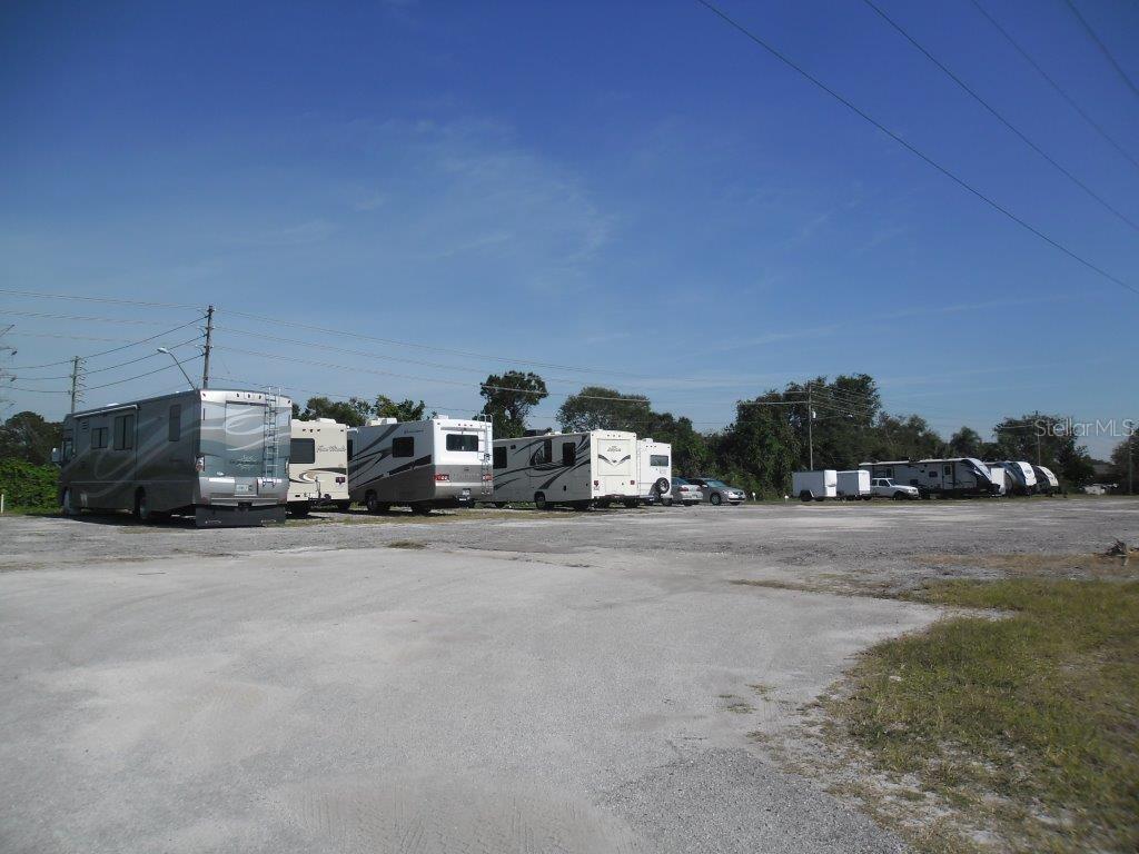 116 Maple Leaf Drive Palm Harbor, FL 34684 - Photo 37 of 38 a car parked on the side of the road
