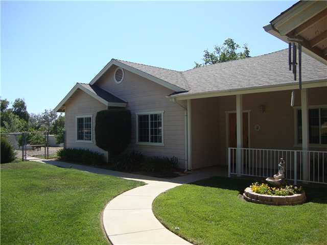 Front of home from walkway to front door