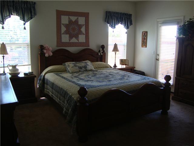 1315 Wilson Road Ramona, CA 92065 - Photo 16 of 25 spacious master bedroom with door to private patio and spa