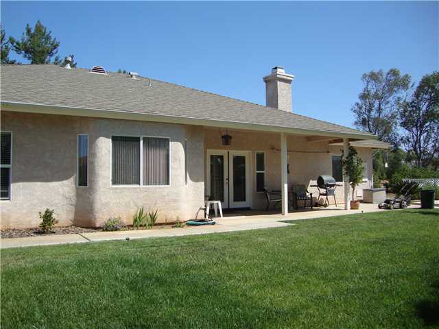 1315 Wilson Road Ramona, CA 92065 - Photo 3 of 25 Backyard with covered patio