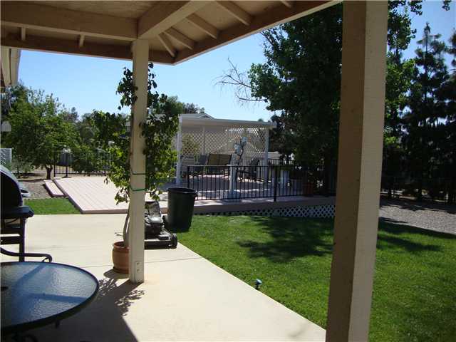 1315 Wilson Road Ramona, CA 92065 - Photo 21 of 25 View from covered patio to wood deck