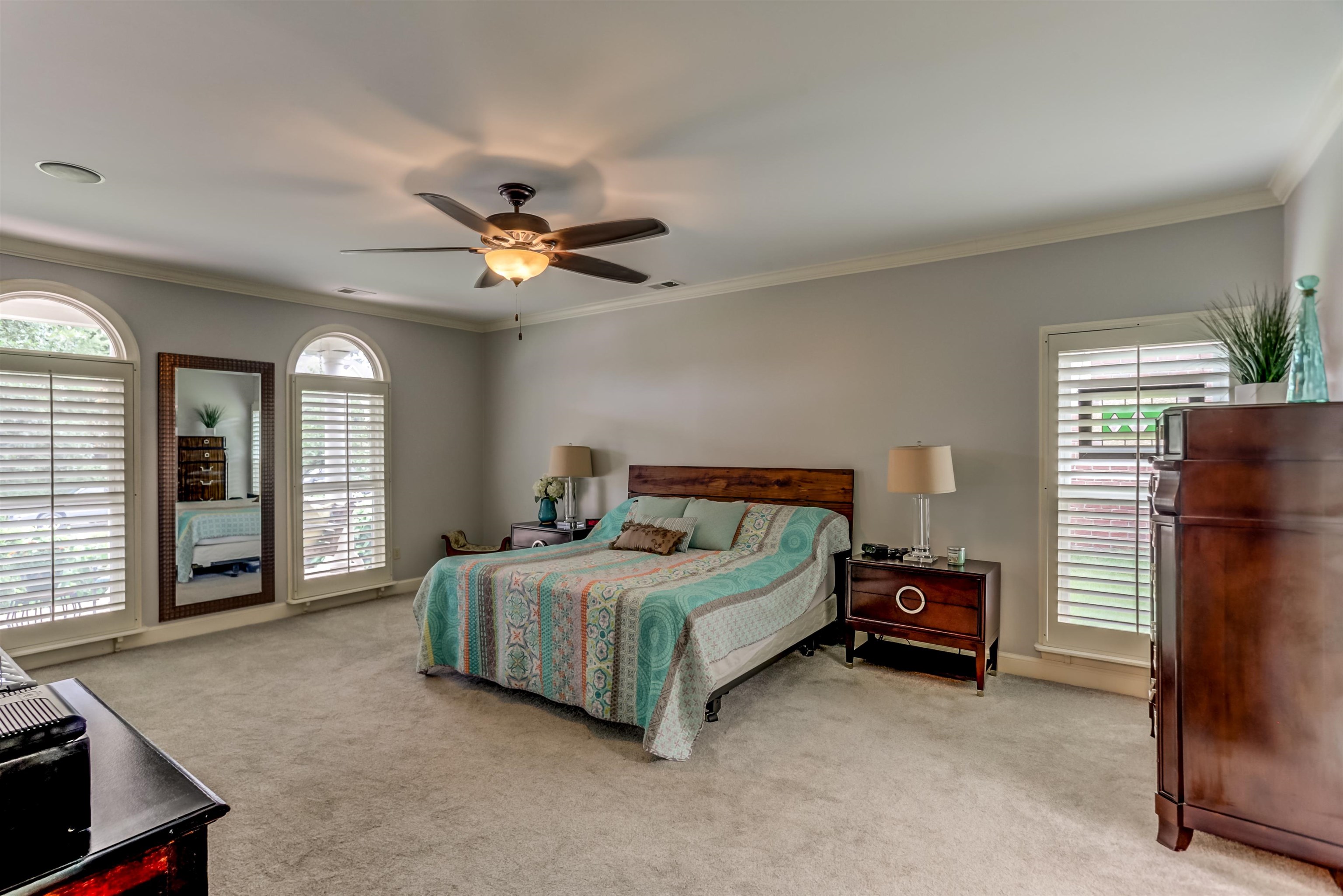 619 Roxburgh Drive Collierville, TN 38017 - Photo 16 of 30 The primary suite is downstairs, and has been renovated. There is new carpet, plus plenty of space for a sitting area and king-sized bed.