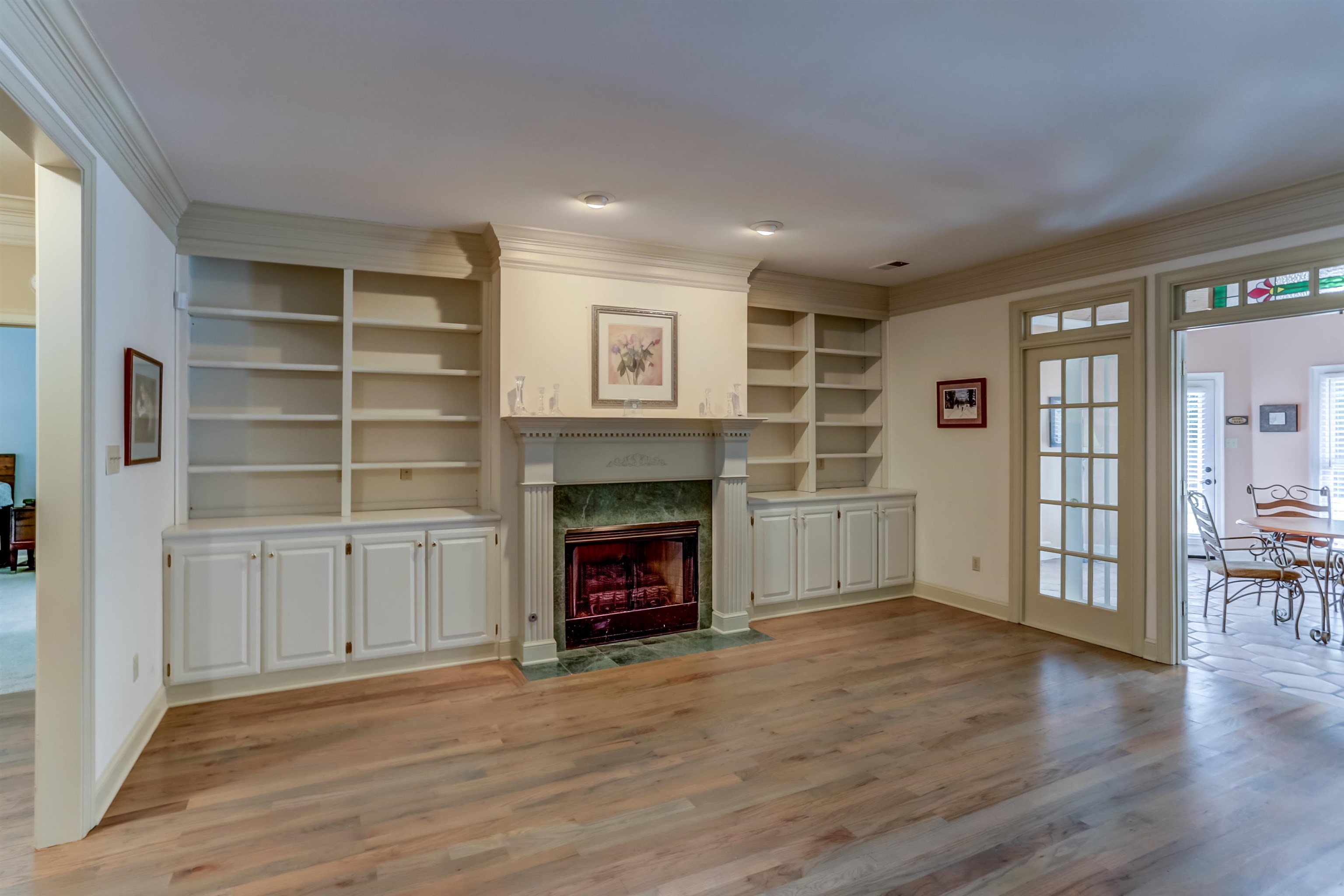619 Roxburgh Drive Collierville, TN 38017 - Photo 7 of 30 The seller has replaced the oak hardwood flooring with wider boards and a more contemporary stain.