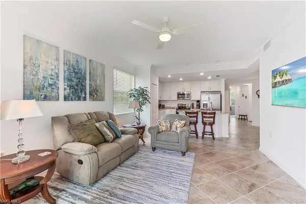 a living room with furniture and a table