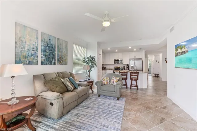 a living room with furniture and a table