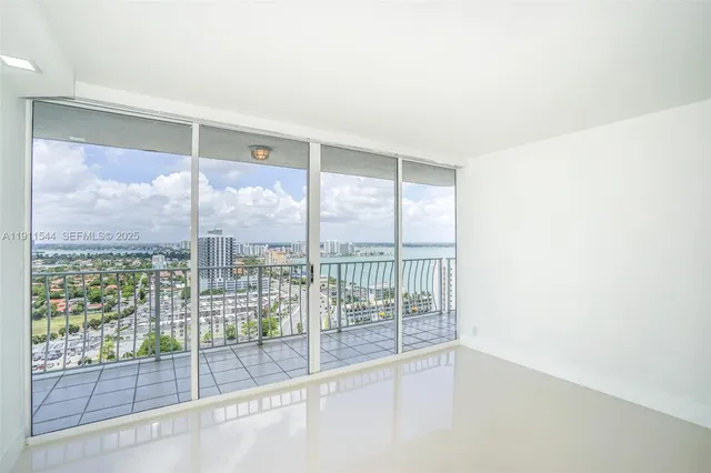 a bathroom with a toilet sink and shower