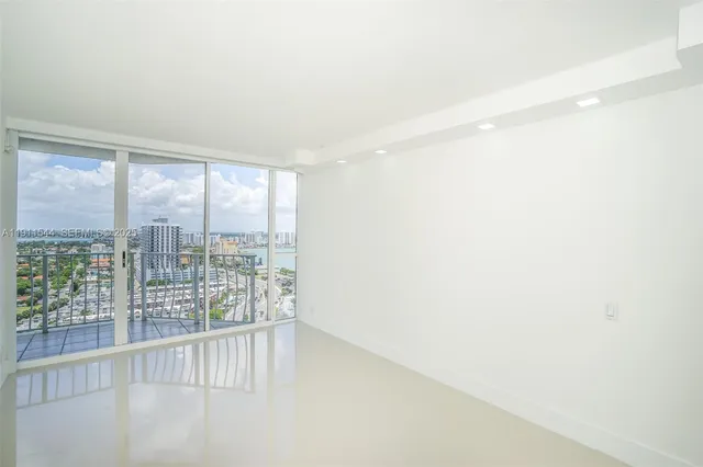 a view of a room that has a glass door