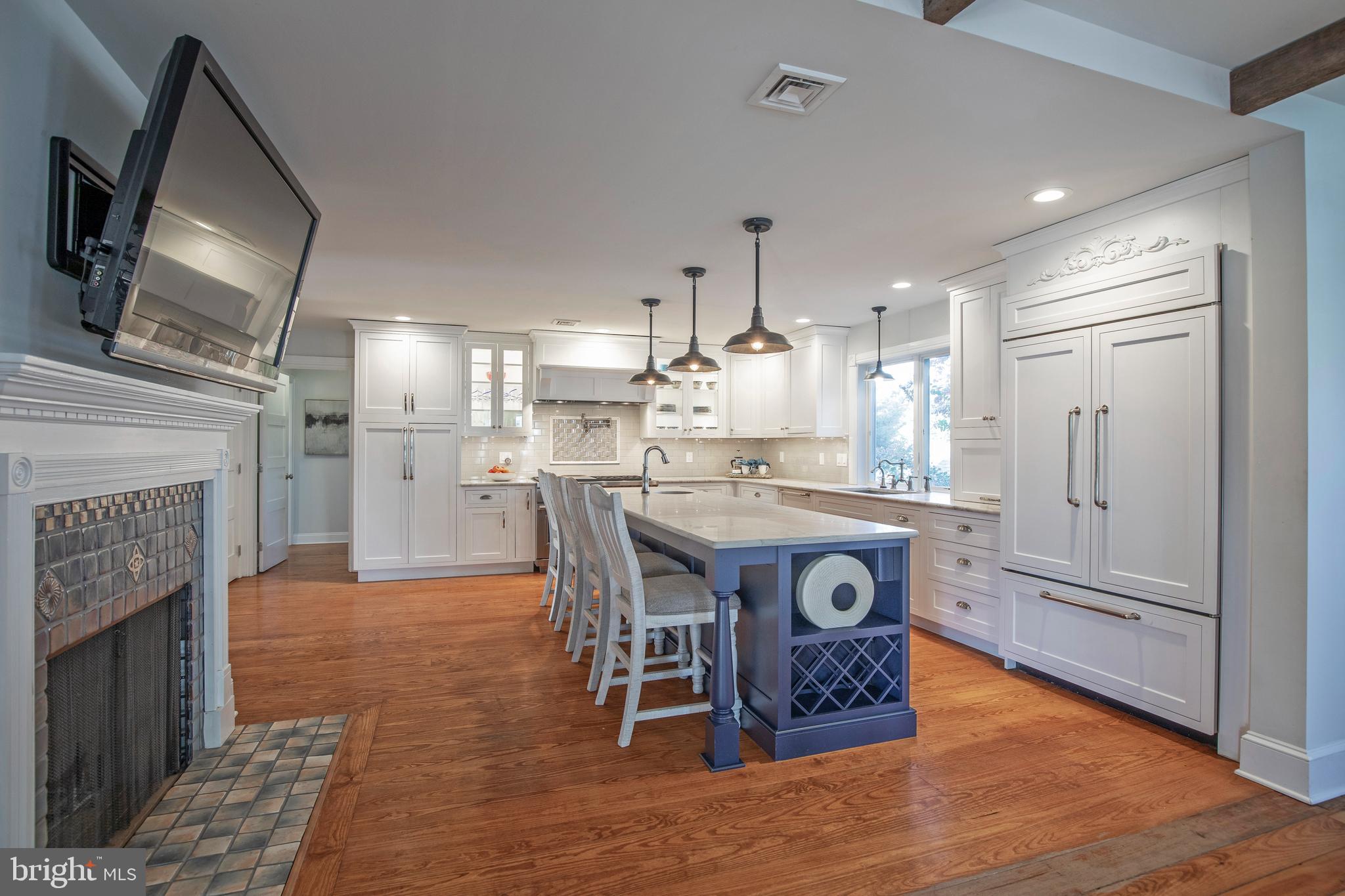 193 Decatur Street Doylestown, PA 18901 - Photo 16 of 60 a view of kitchen island with furniture and wooden floor
