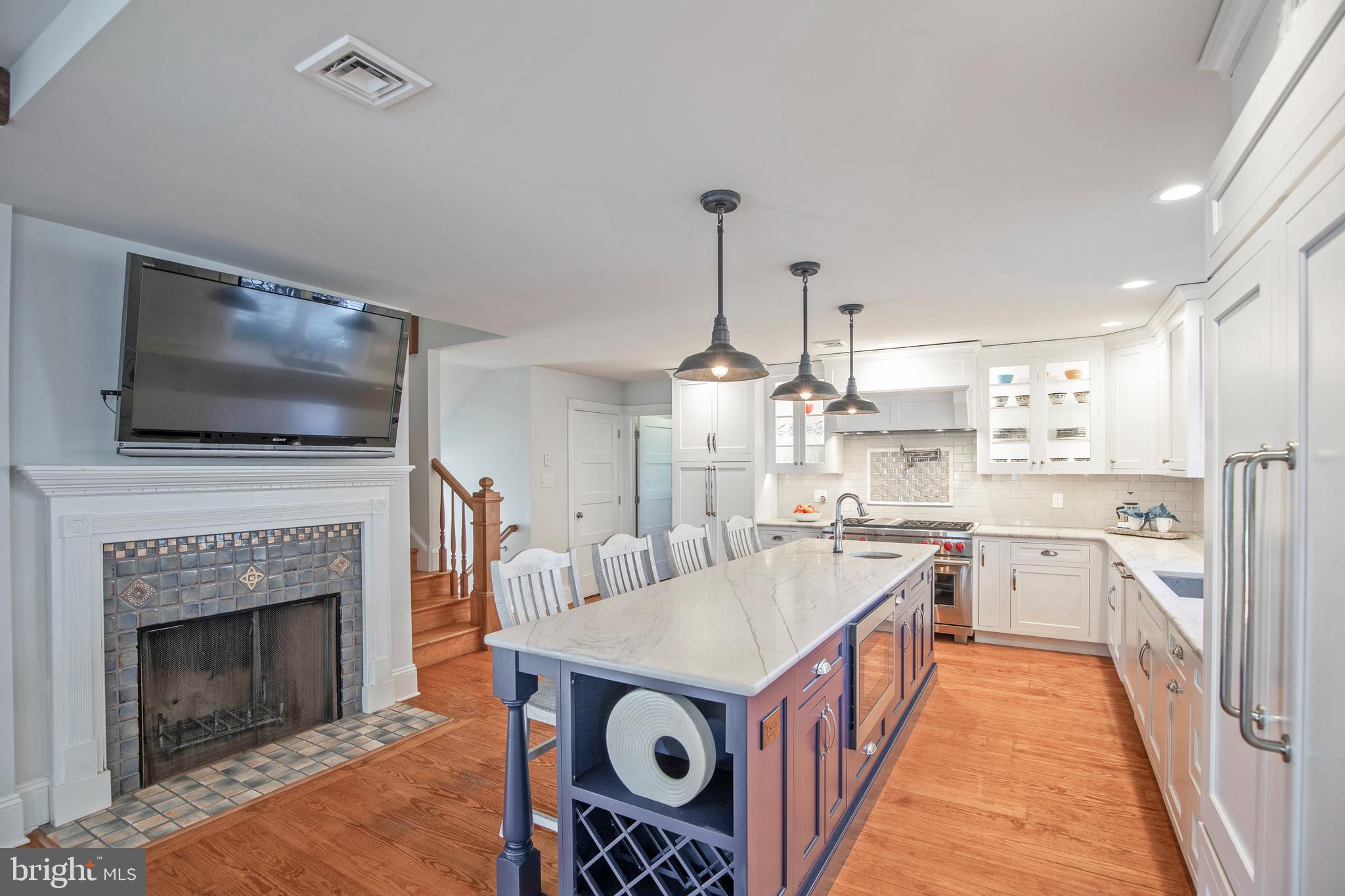 193 Decatur Street Doylestown, PA 18901 - Photo 17 of 60 a kitchen with a stove oven and a fireplace