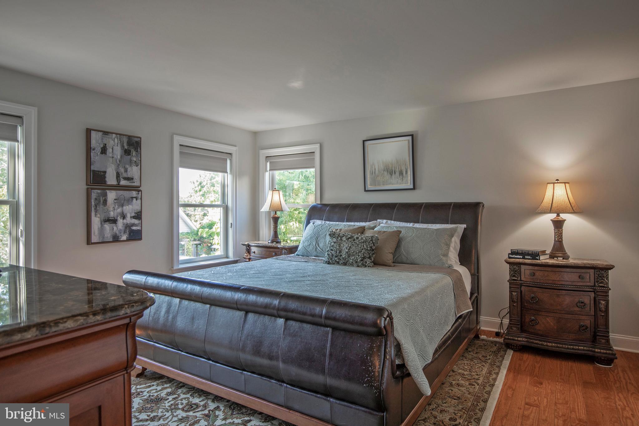 193 Decatur Street Doylestown, PA 18901 - Photo 25 of 60 a bedroom with a bed and a night stand