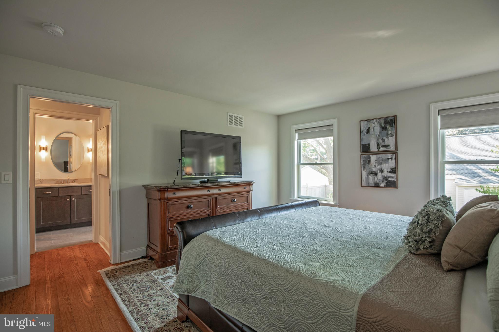 193 Decatur Street Doylestown, PA 18901 - Photo 27 of 60 a bedroom with a bed and a flat screen tv