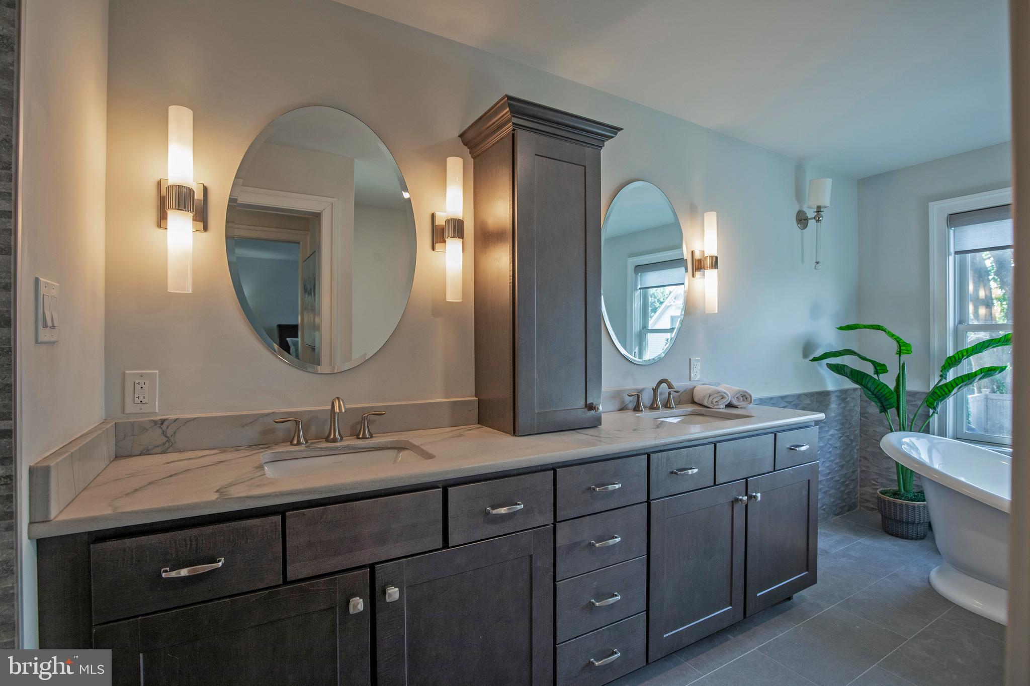 193 Decatur Street Doylestown, PA 18901 - Photo 29 of 60 a bathroom with a double vanity sink and a mirror