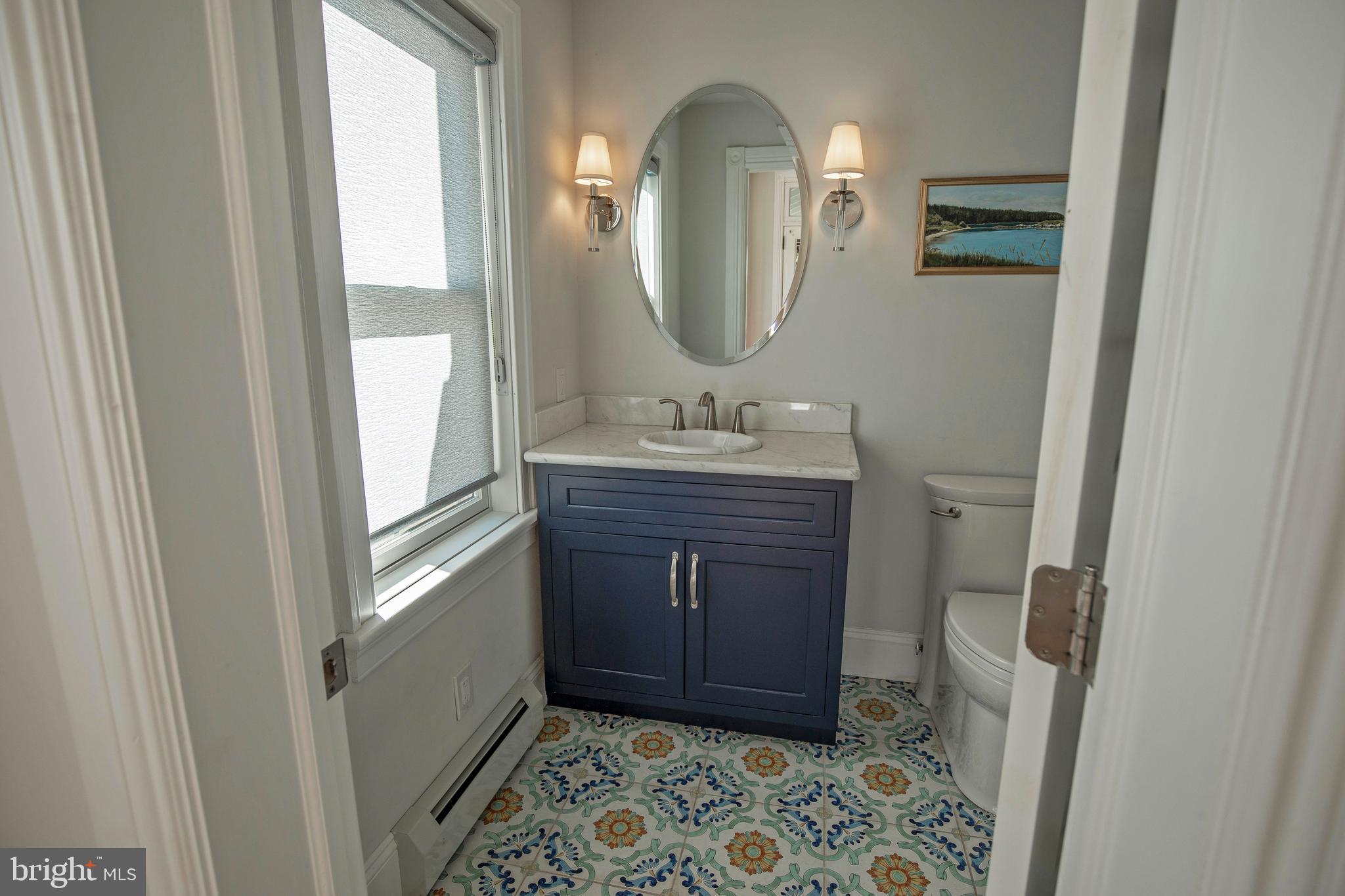 193 Decatur Street Doylestown, PA 18901 - Photo 34 of 60 a bathroom with a mirror a sink and a mirror
