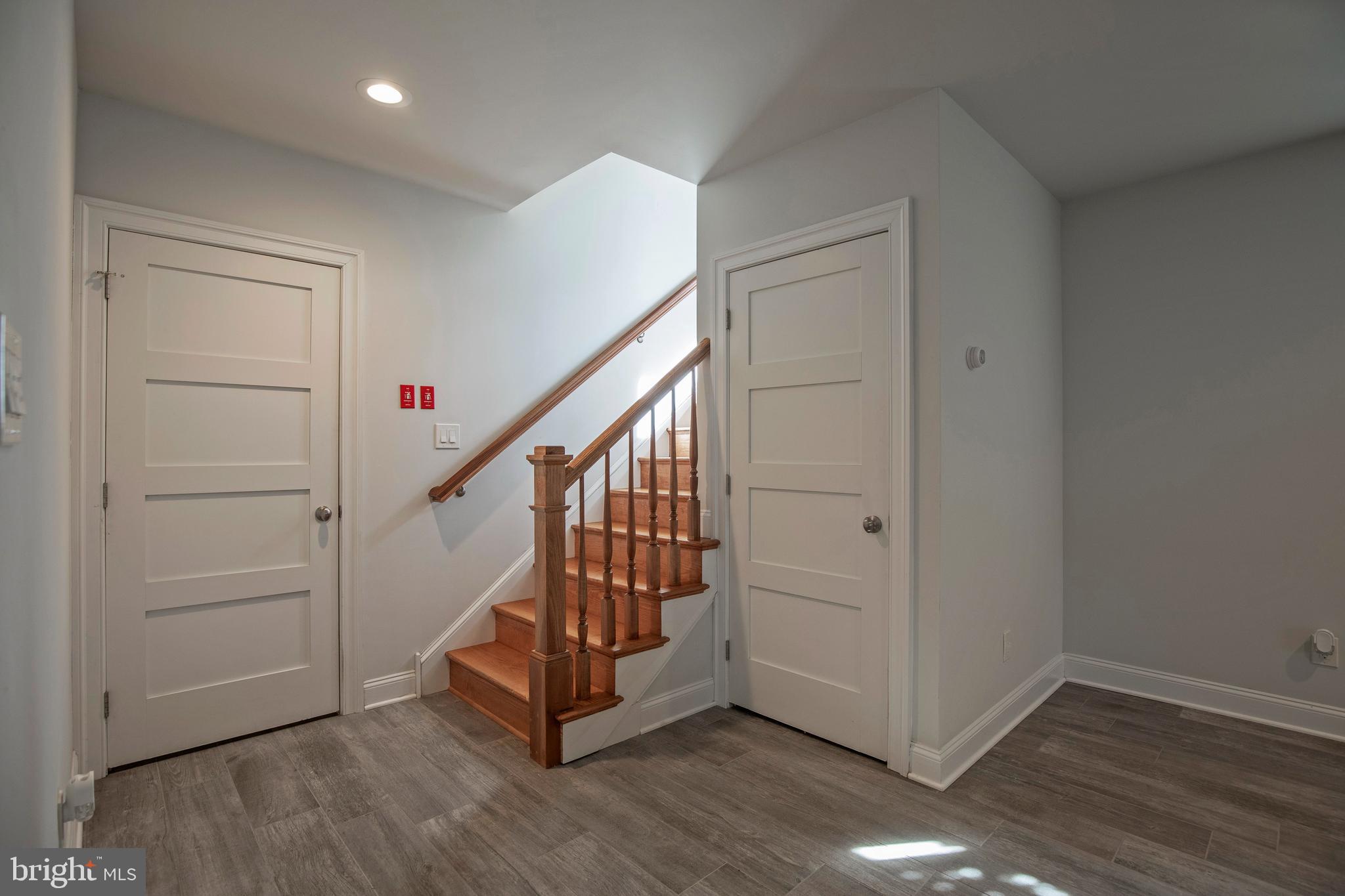 193 Decatur Street Doylestown, PA 18901 - Photo 35 of 60 a view of a hallway with wooden floor and stairs