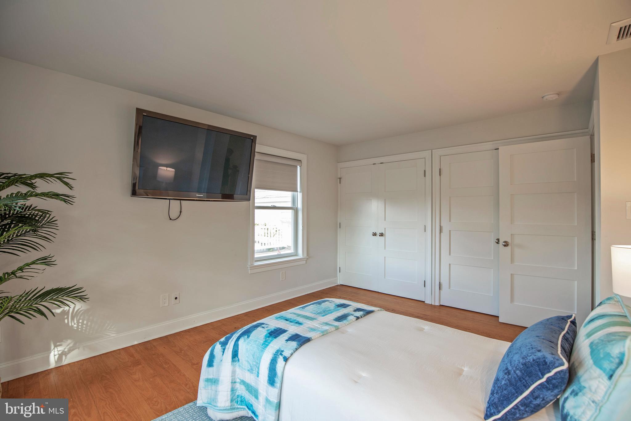 193 Decatur Street Doylestown, PA 18901 - Photo 43 of 60 a bedroom with a bed and a flat screen tv