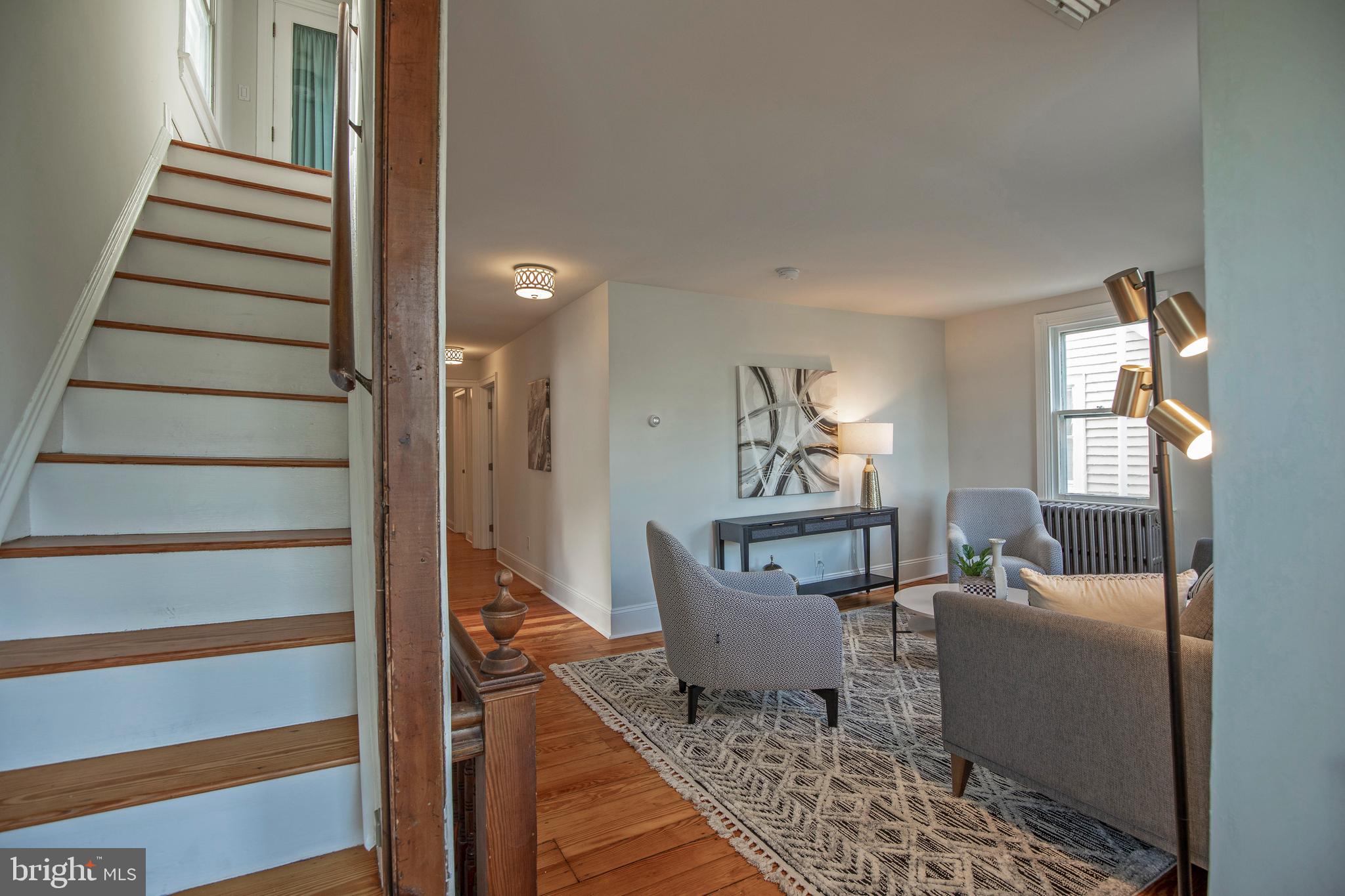 193 Decatur Street Doylestown, PA 18901 - Photo 52 of 60 a living room with furniture and a fireplace