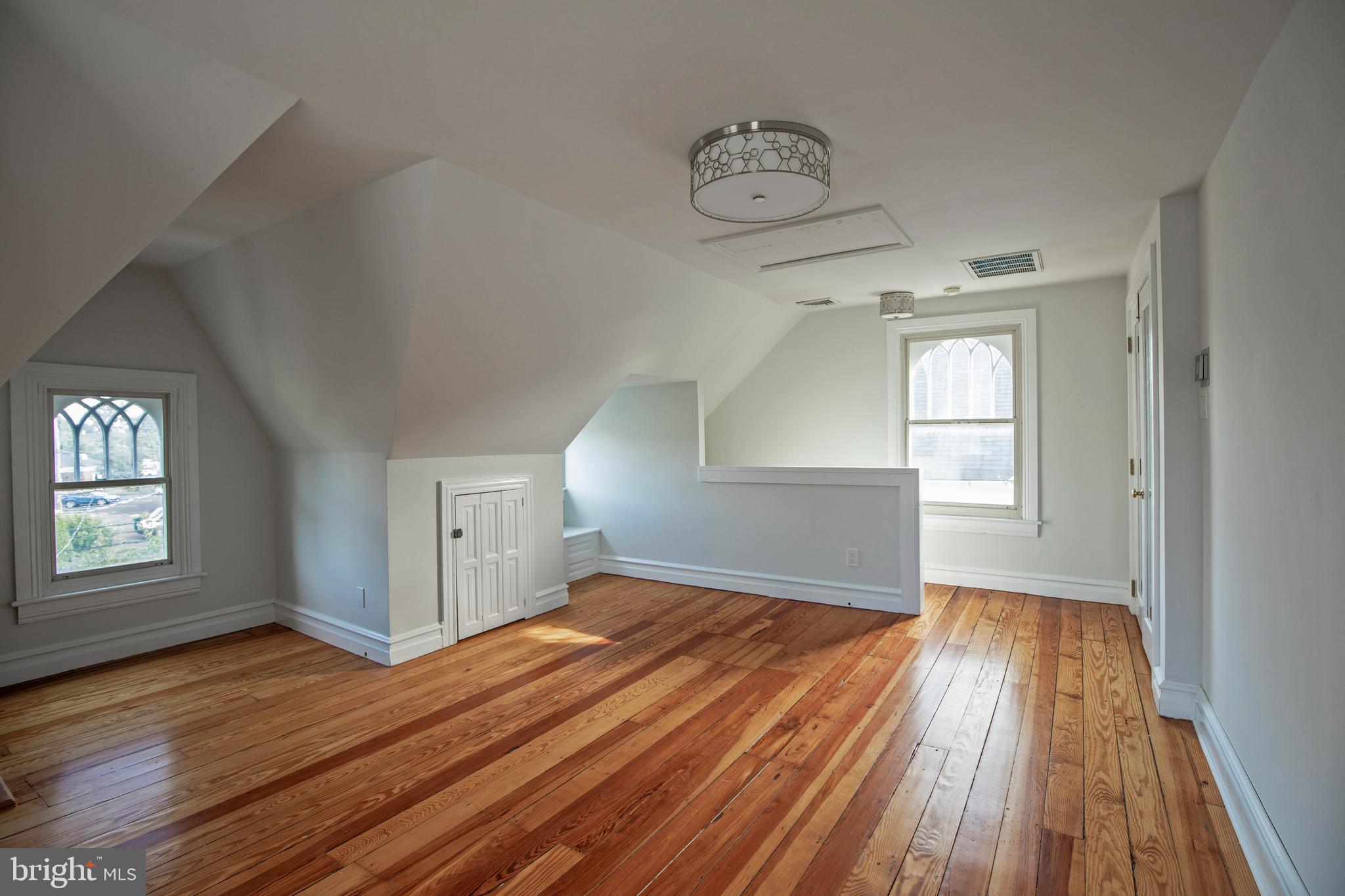 193 Decatur Street Doylestown, PA 18901 - Photo 54 of 60 a view of empty room with wooden floor and fan