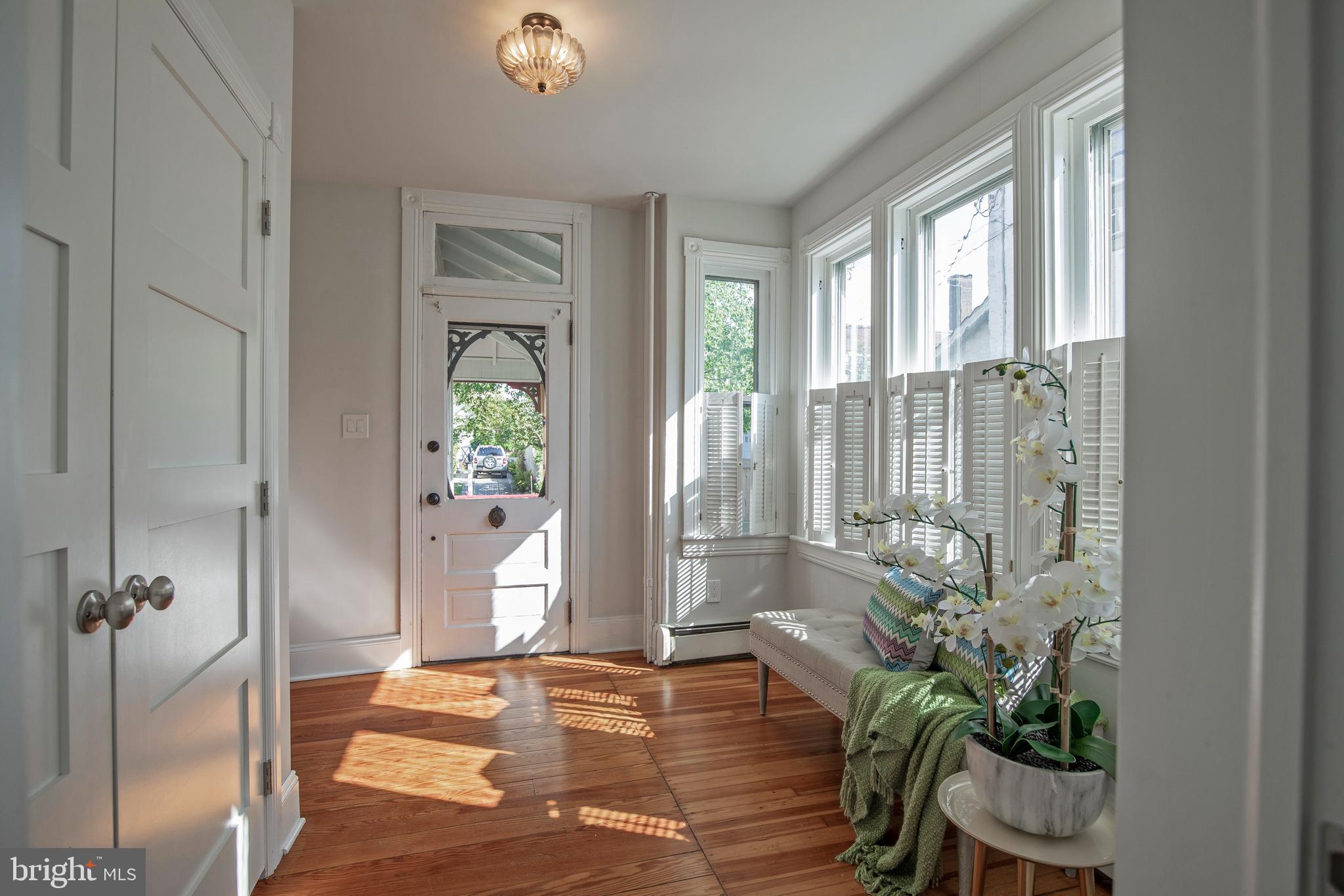 193 Decatur Street Doylestown, PA 18901 - Photo 6 of 60 a living room with furniture and a potted plant
