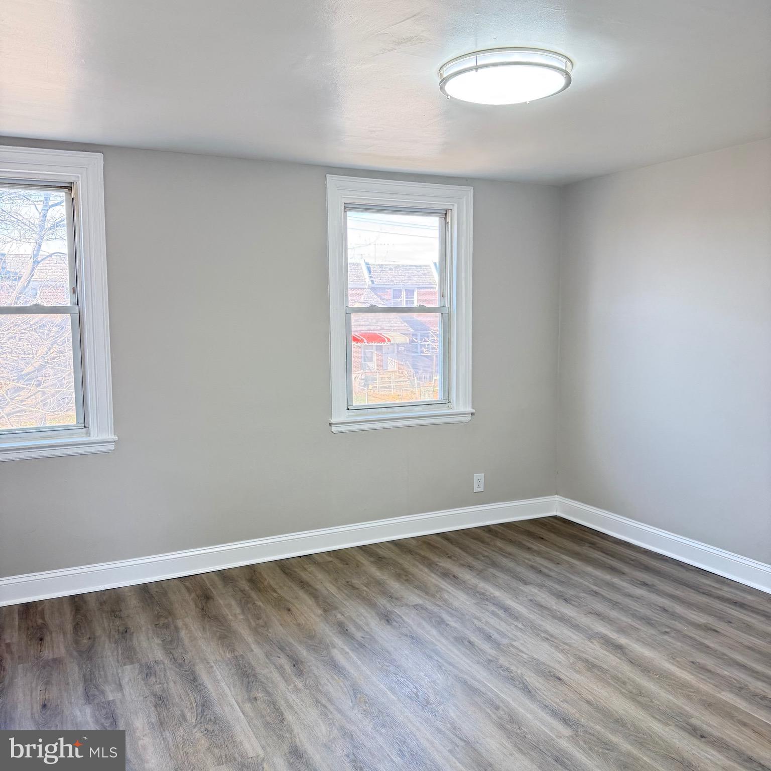 7219 Large Street Philadelphia, PA 19149 - Photo 20 of 20 a view of a room that has wooden floor and windows in it