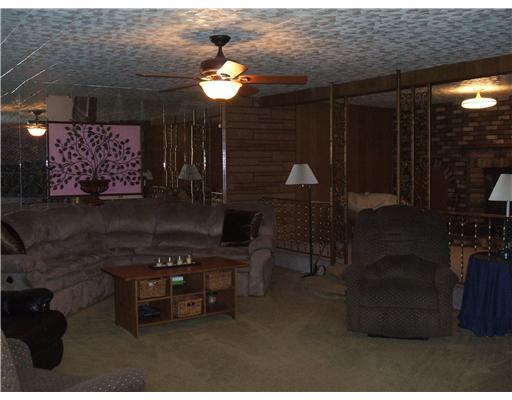 39 Hancock Camp Road Pittsburgh, PA 15238 - Photo 4 of 10 Living Room. Super-sized living room w/wood burning fireplace.....and raised den beside a cozy fire.