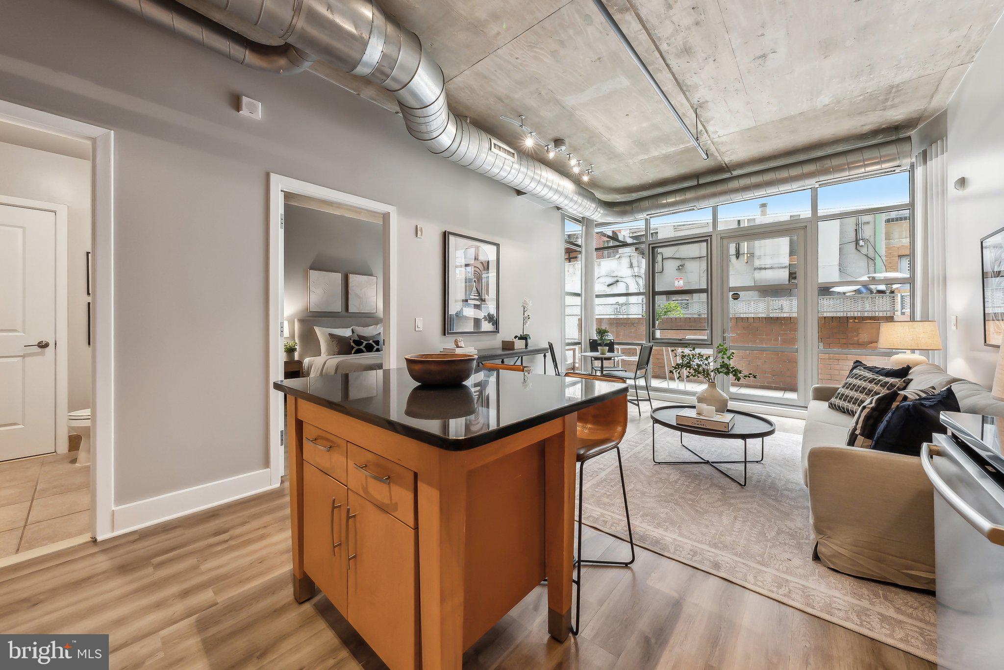 1444 Church Street Northwest, Unit 103 Washington, DC 20005 - Photo 26 of 26 Open floor plan brings in great light