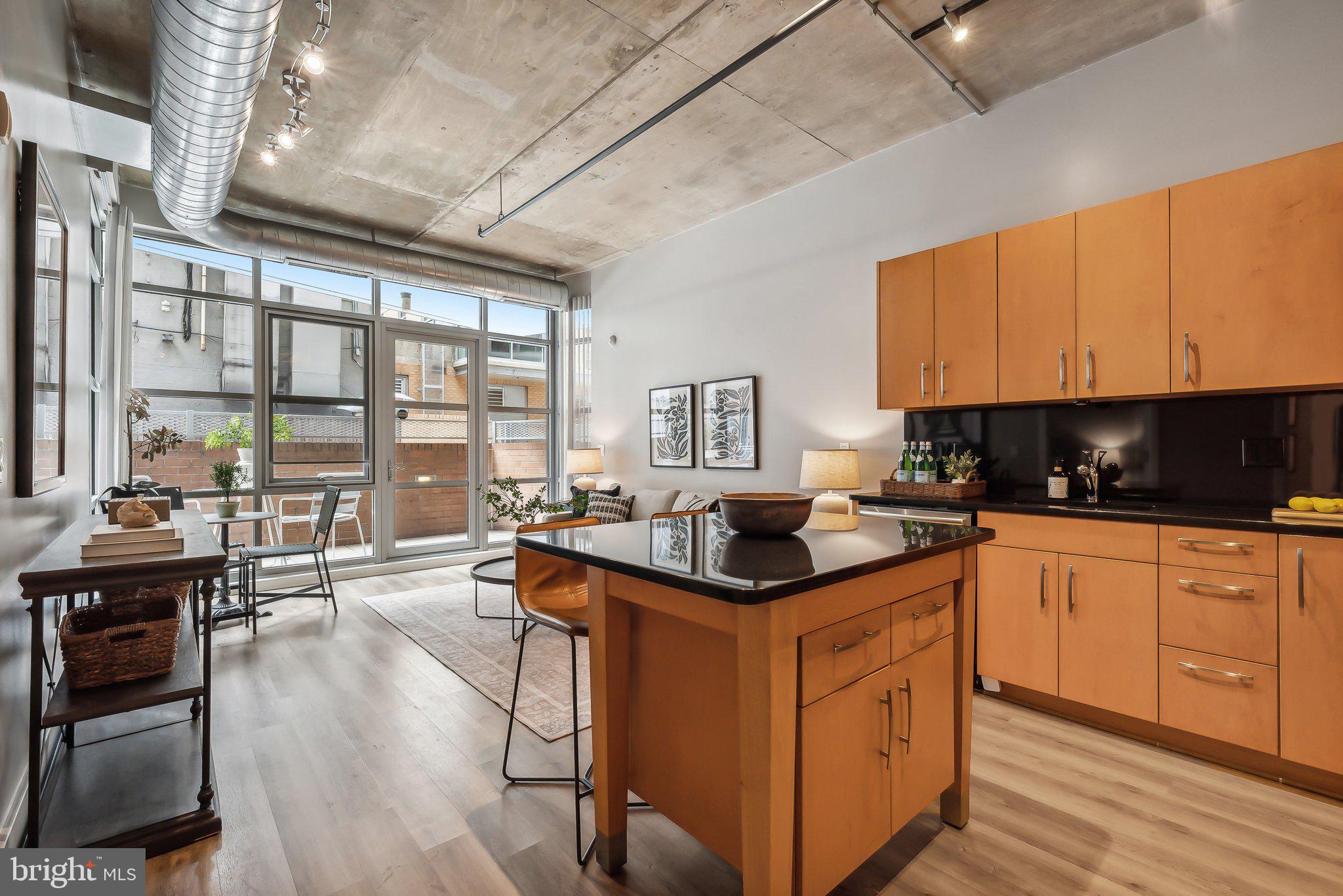 1444 Church Street Northwest, Unit 103 Washington, DC 20005 - Photo 2 of 26 Beautiful finishes with wall to ceiling windows