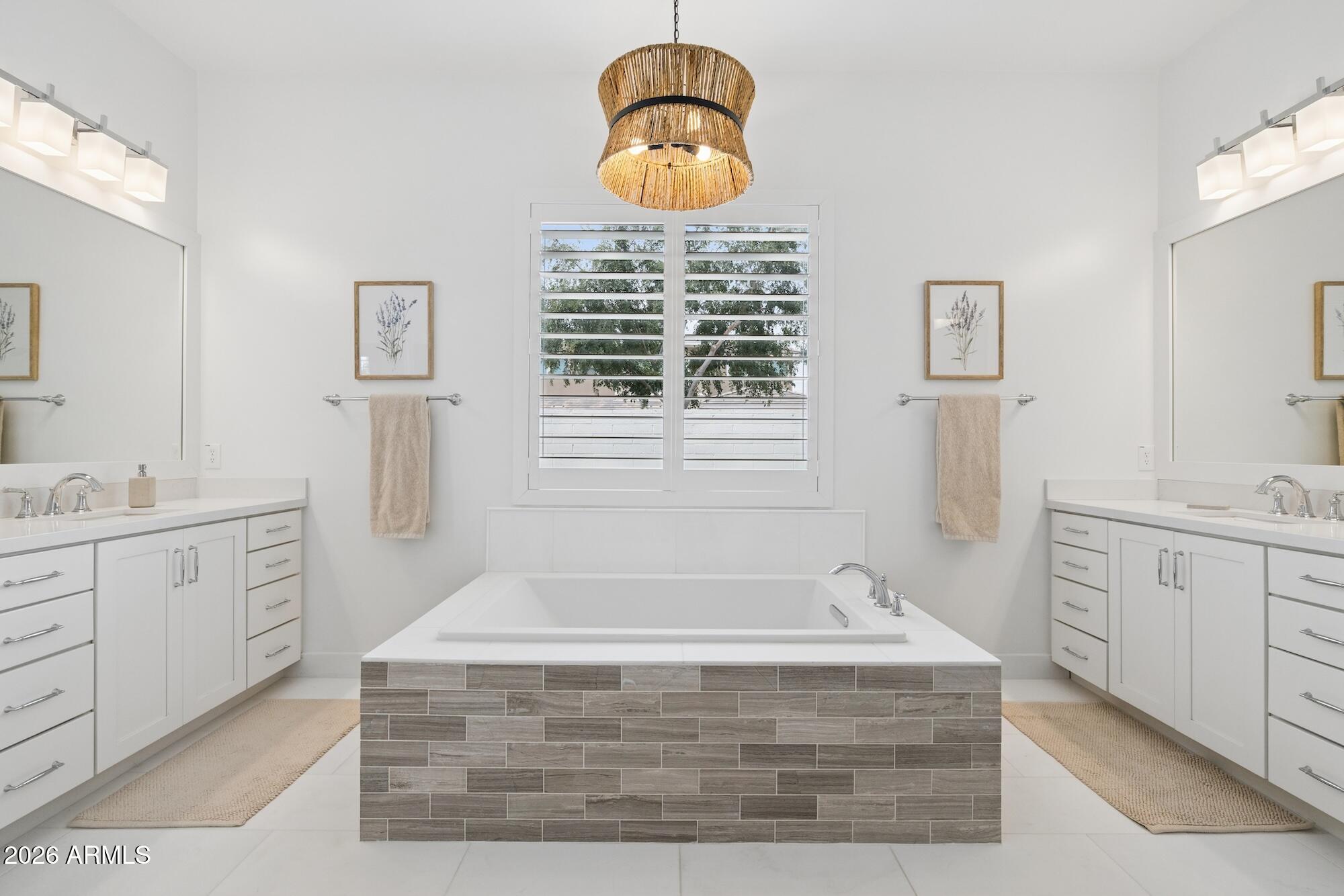 2633 East Geronimo Street Gilbert, AZ 85295 - Photo 53 of 75 a bathroom with a tub sink and window