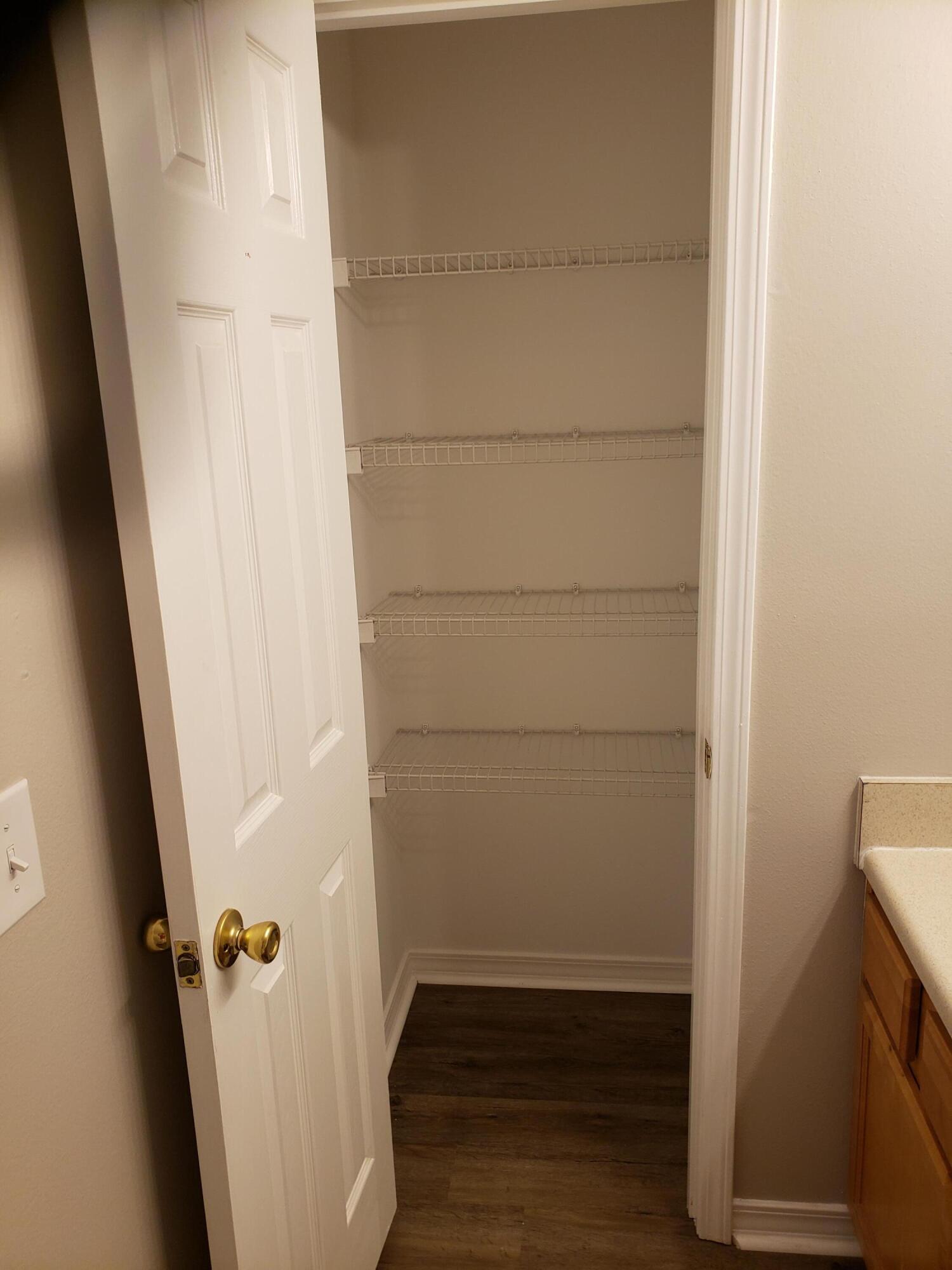 2127 Tom Street Navarre, FL 32566 - Photo 11 of 14 wooden floor in an empty room