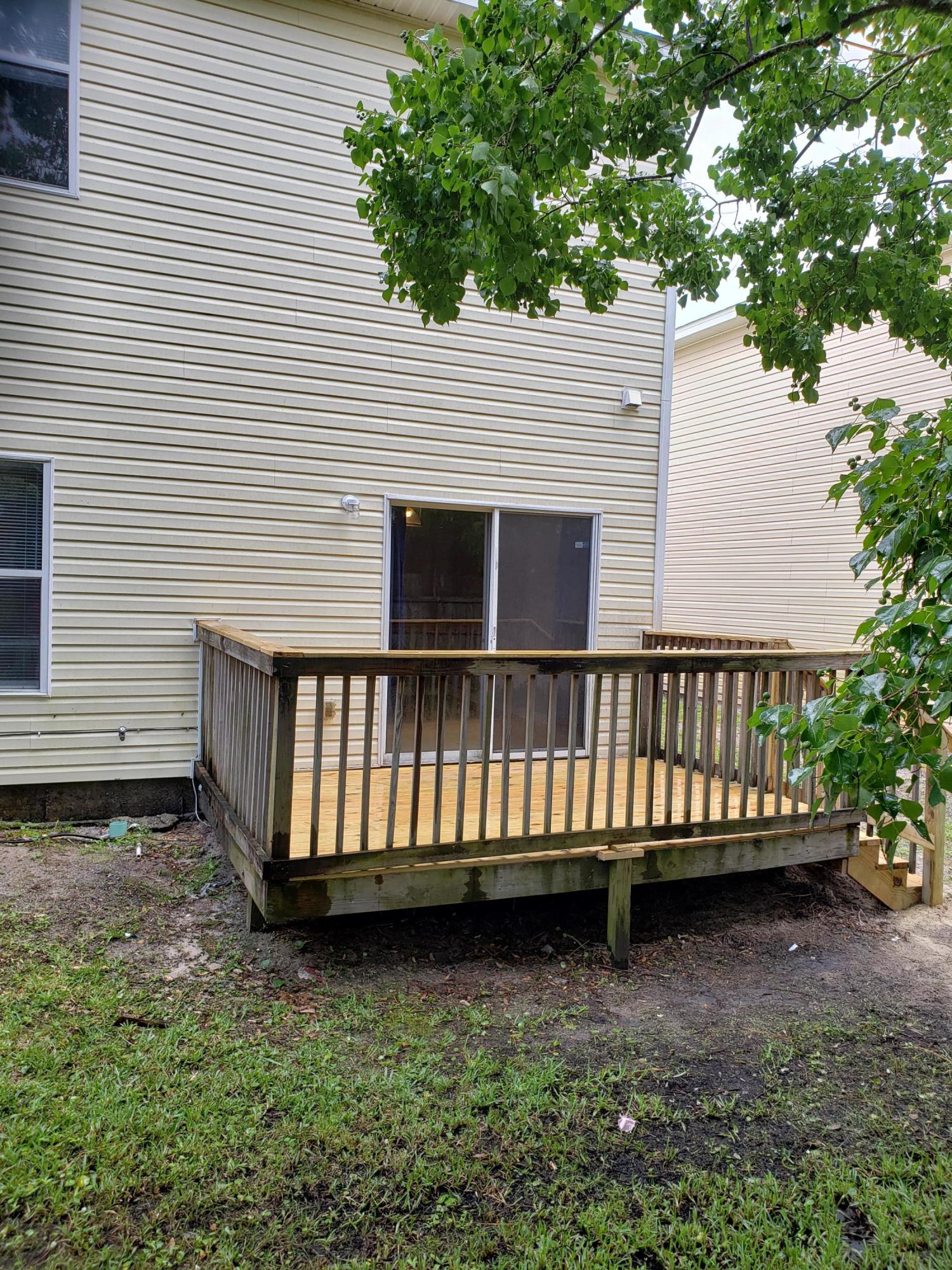 2127 Tom Street Navarre, FL 32566 - Photo 13 of 14 a view of a backyard