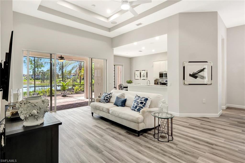3376 Sandpiper Way Naples, FL 34109 - Photo 1 of 50 Grand, Airy Feeling Living Room