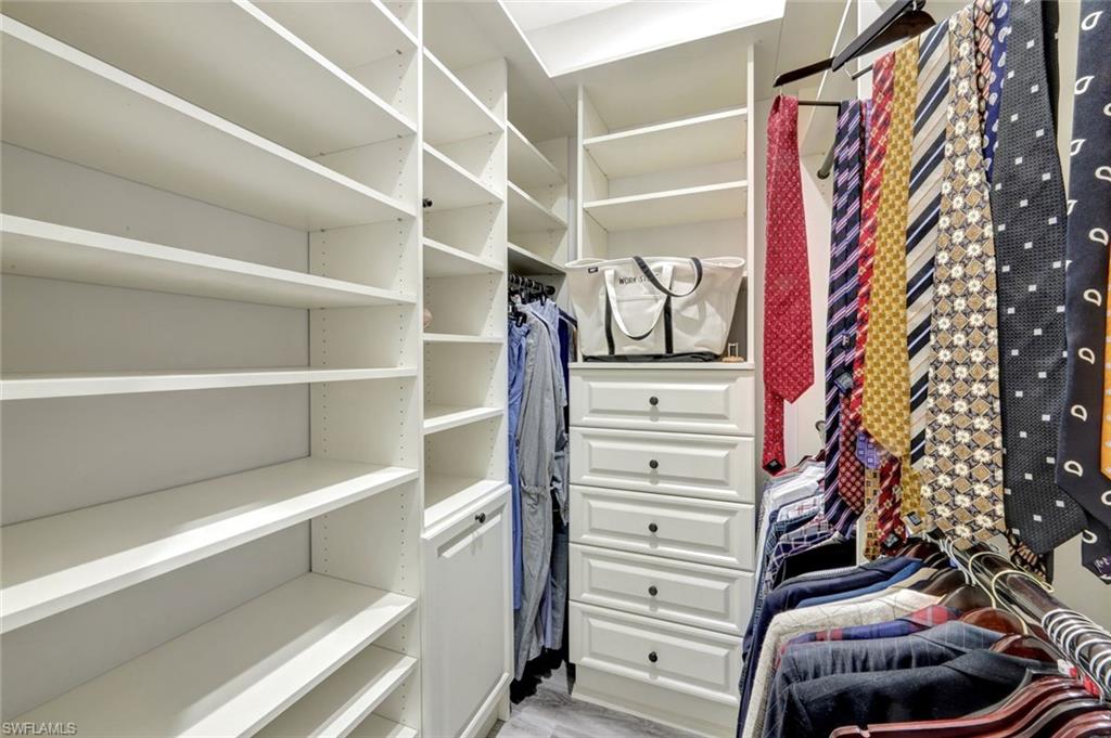 3376 Sandpiper Way Naples, FL 34109 - Photo 26 of 50 Custom Organized Walk-in Closet