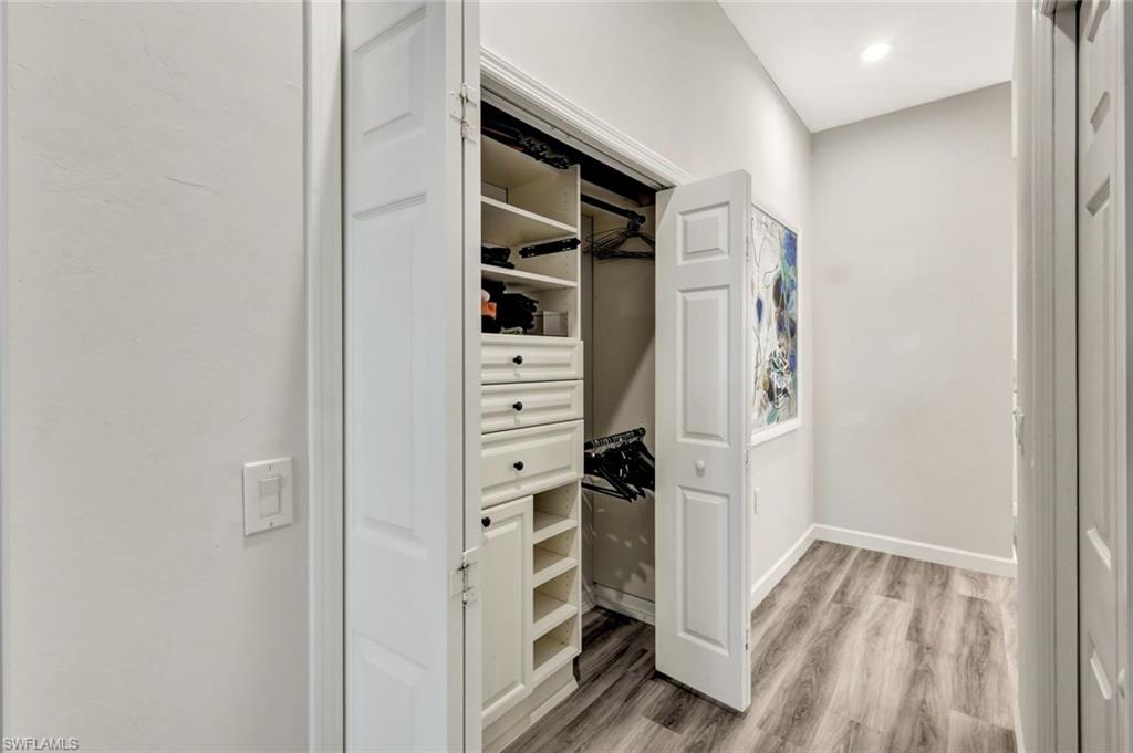 3376 Sandpiper Way Naples, FL 34109 - Photo 27 of 50 Custom Organized 2nd Closet