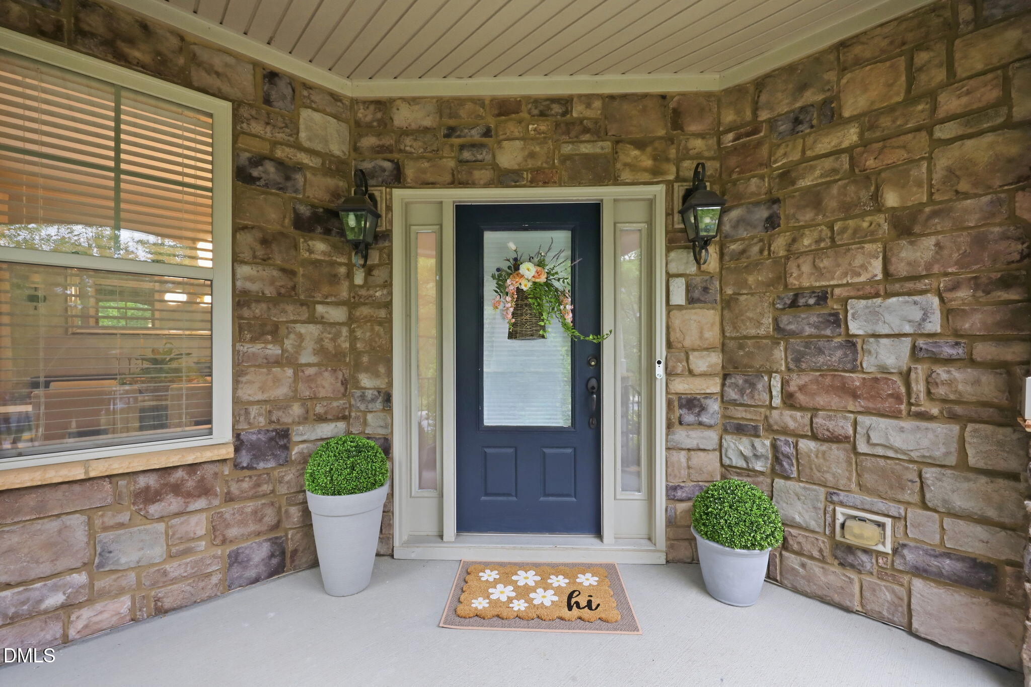 162 Gathering Place Durham, NC 27713 - Photo 37 of 52 a front view of a house with a potted plant